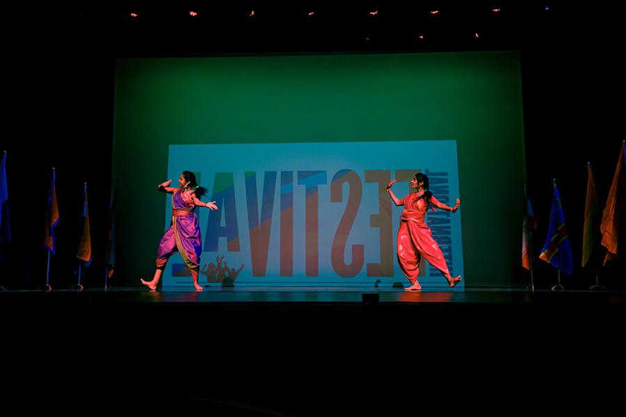 Students dancing on stage at the International Festival